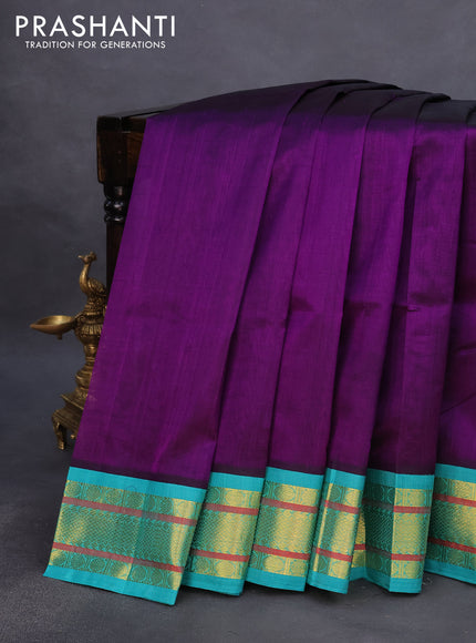 Silk cotton saree purple and teal blue with plain body and zari woven korvai border