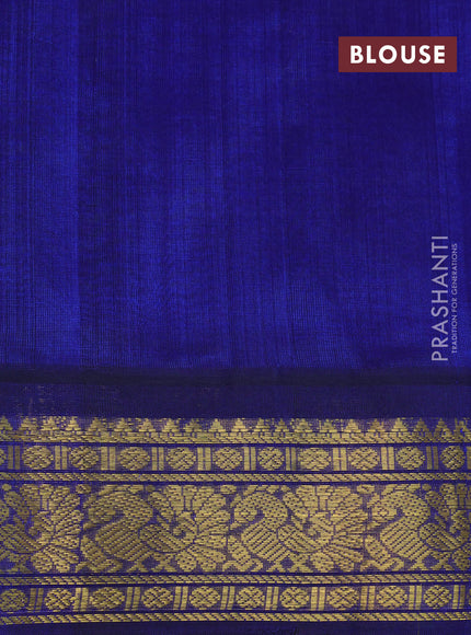 Silk cotton saree green and blue with plain body and annam zari woven korvai border