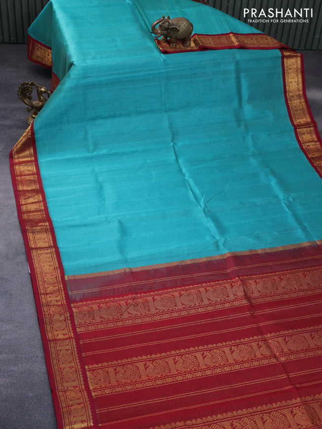 Silk cotton saree teal green shade and maroon with allover vairosi pattern and zari woven korvai border