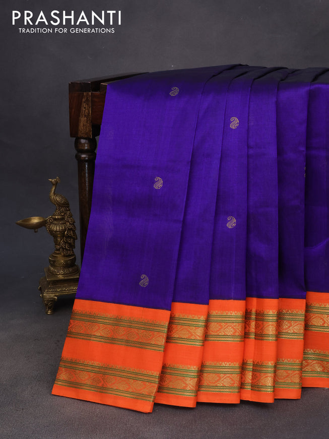 Silk cotton saree blue and orange with plain body and rettapet zari woven korvai border