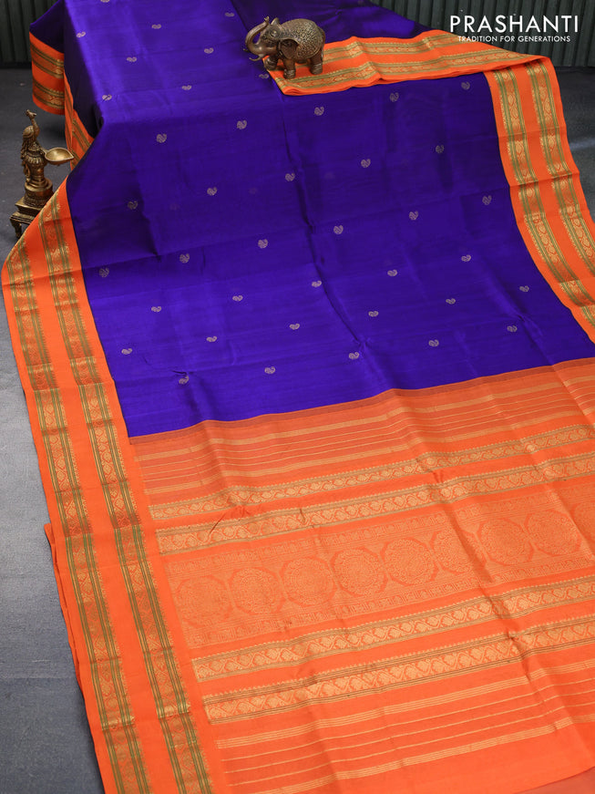 Silk cotton saree blue and orange with plain body and rettapet zari woven korvai border