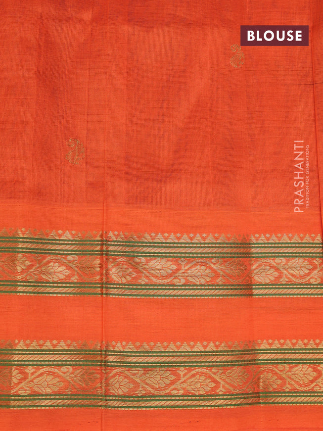 Silk cotton saree blue and orange with plain body and rettapet zari woven korvai border