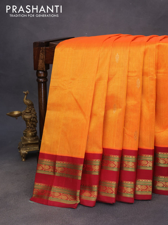 Silk cotton saree mango yellow and maroon with plain body and rettapet zari woven korvai border