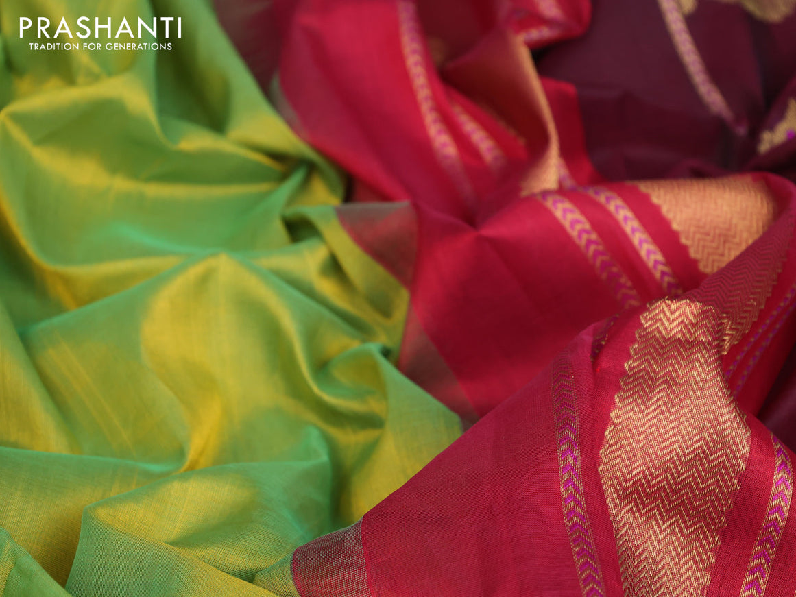 Silk cotton saree dual shade of light green and kumkum red with plain body and zari woven annam butta korvai border