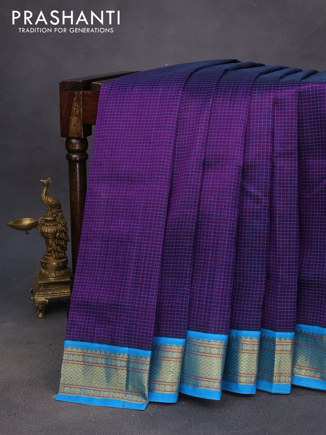 Silk cotton saree deep violet and cs blue with allover checked pattern and zari woven korvai border