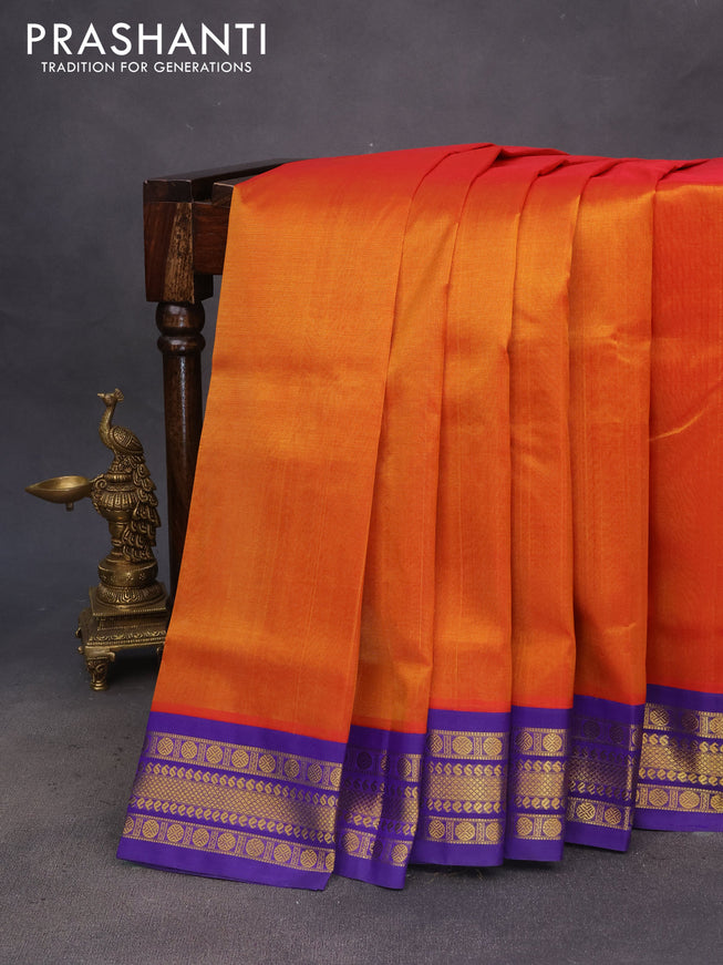 Silk cotton saree rustic orange and blue with plain body and zari woven korvai border