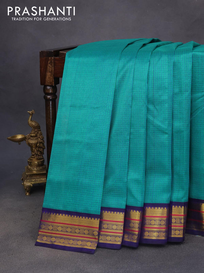 Silk cotton saree teal green and blue with allover checked pattern and zari woven korvai border