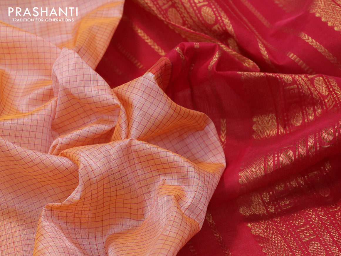 Silk cotton saree peach orange and red with allover checked pattern and zari woven korvai border