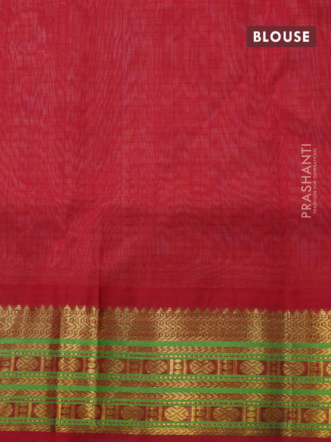 Silk cotton saree peach orange and red with allover checked pattern and zari woven korvai border