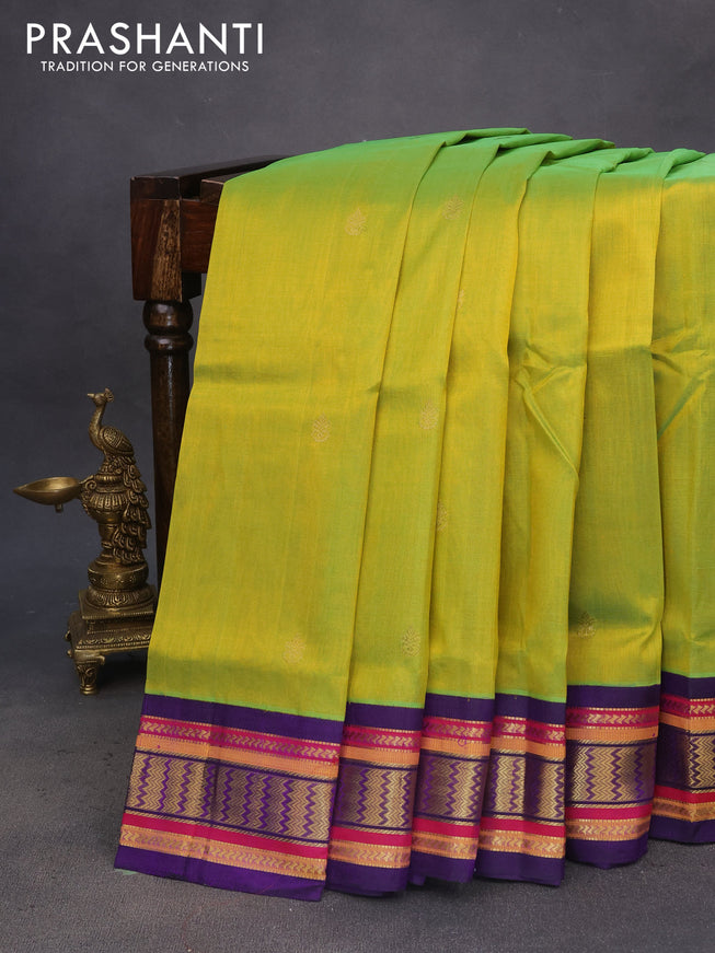 Silk cotton saree dual shade of light green and violet with zari woven buttas and zari woven korvai border