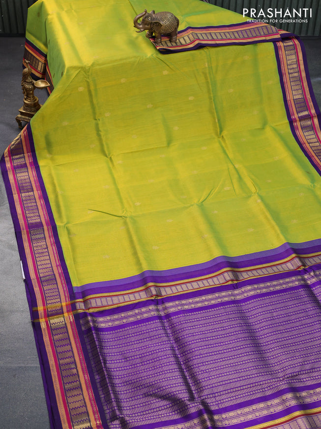 Silk cotton saree dual shade of light green and violet with zari woven buttas and zari woven korvai border