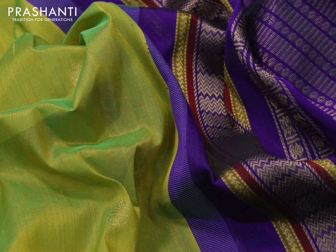 Silk cotton saree dual shade of light green and violet with zari woven buttas and zari woven korvai border