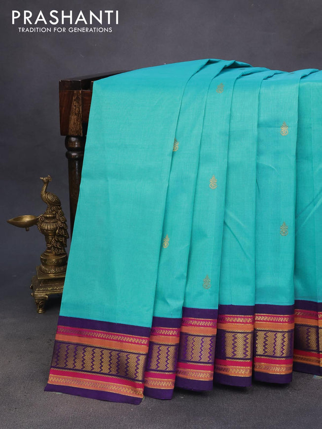 Silk cotton saree teal blue and violet with zari woven buttas and zari woven korvai border