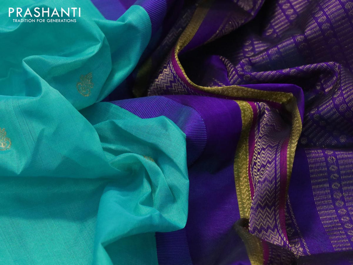 Silk cotton saree teal blue and violet with zari woven buttas and zari woven korvai border