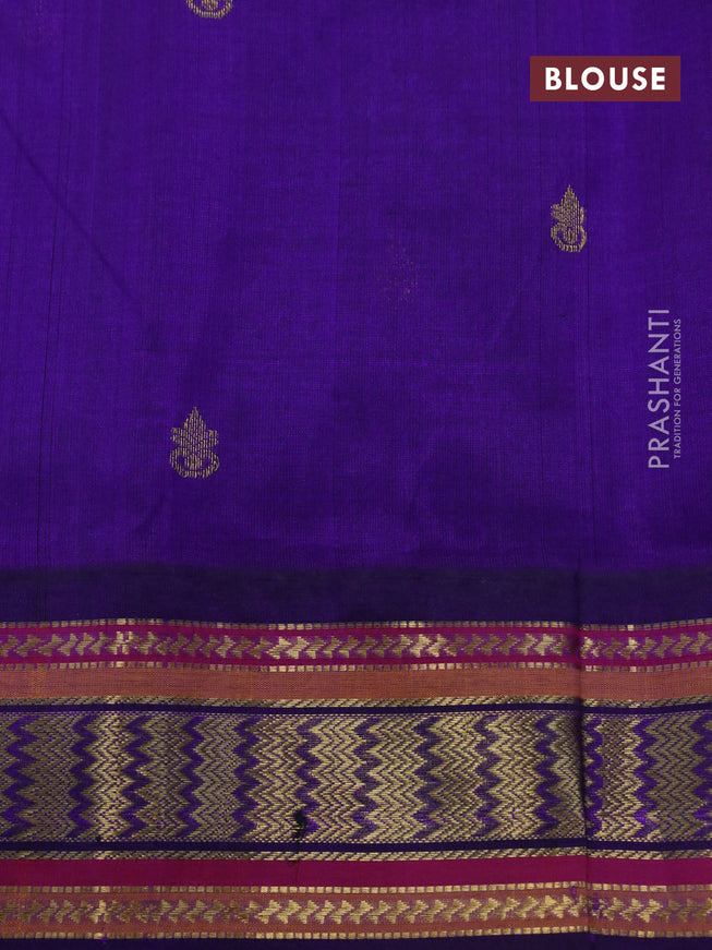 Silk cotton saree teal blue and violet with zari woven buttas and zari woven korvai border