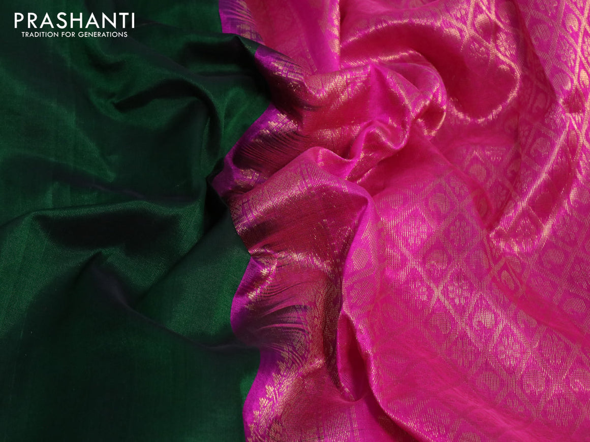 Silk cotton saree dark green and pink with plain body and annam zari woven korvai border