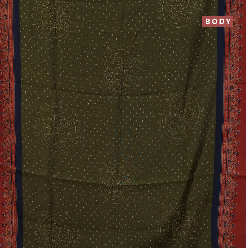 Semi linen saree sap green and rust shade with allover bandhani prints and ajrakh printed pallu