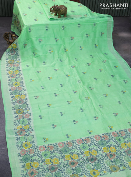 Banarasi raw silk saree light green with thread & zari woven floral buttas and long floral zari woven paithani border