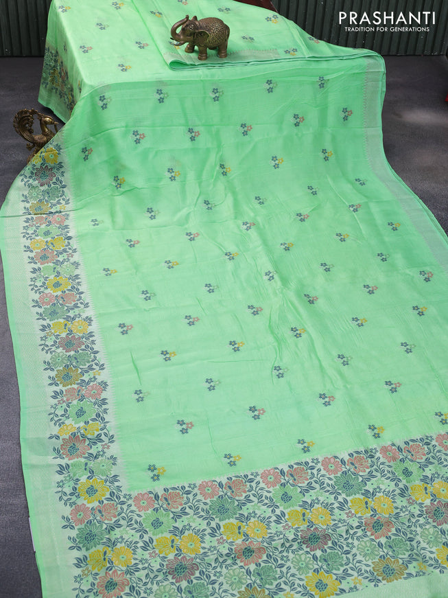 Banarasi raw silk saree light green with thread & zari woven floral buttas and long floral zari woven paithani border