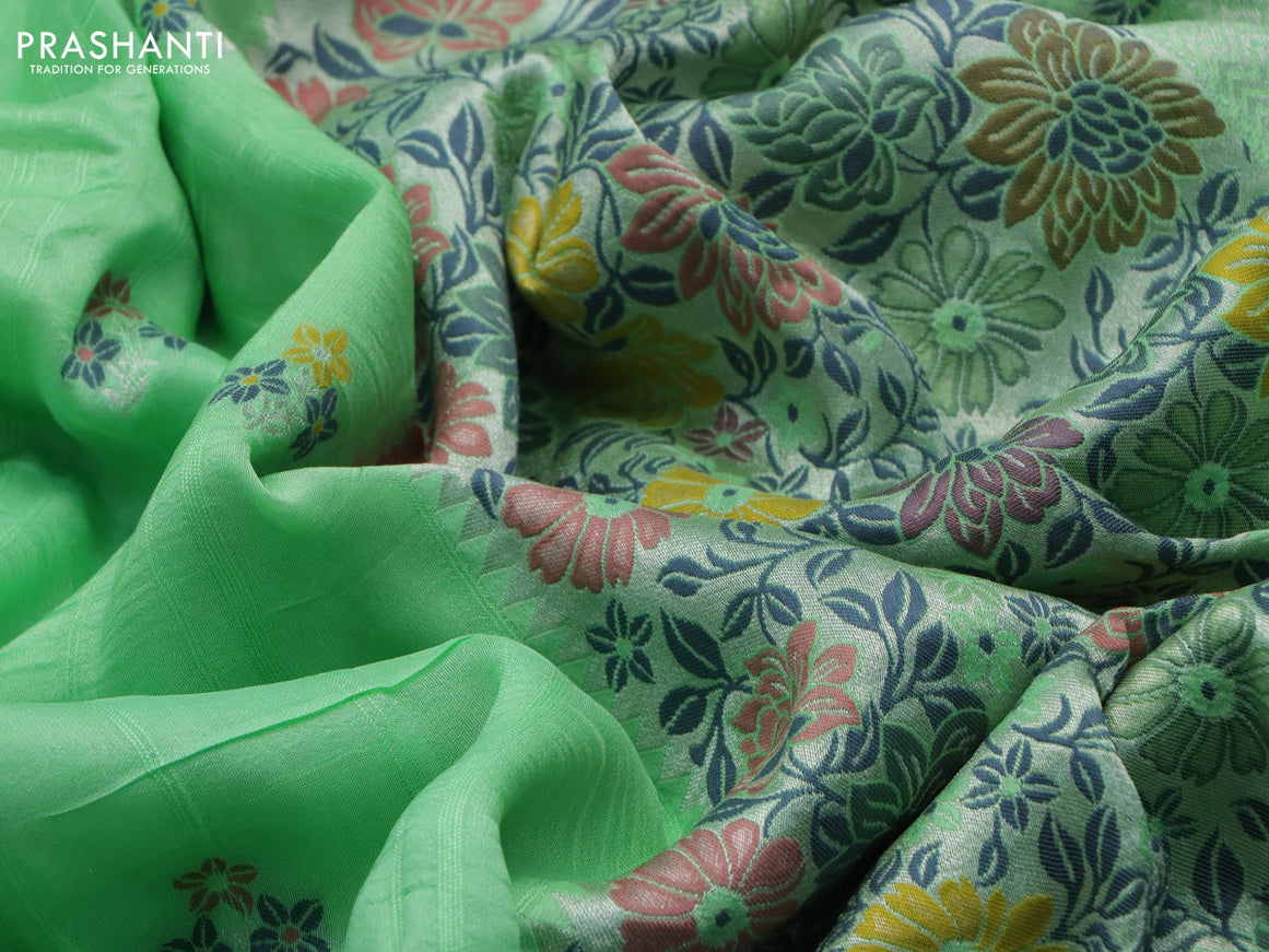 Banarasi raw silk saree light green with thread & zari woven floral buttas and long floral zari woven paithani border