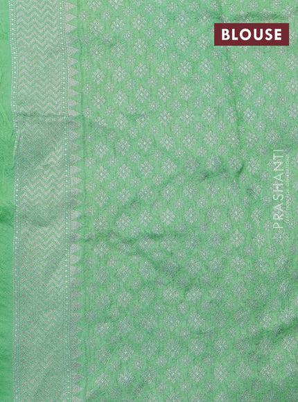 Banarasi raw silk saree light green with thread & zari woven floral buttas and long floral zari woven paithani border