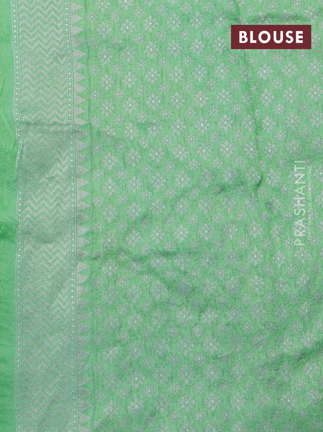 Banarasi raw silk saree light green with thread & zari woven floral buttas and long floral zari woven paithani border