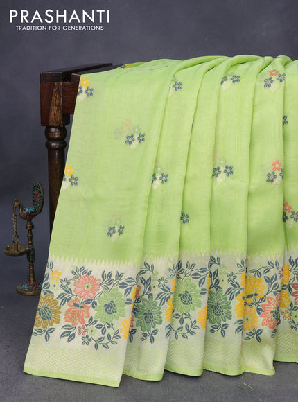 Banarasi raw silk saree fluorescent green with thread & zari woven floral buttas and long floral zari woven paithani border