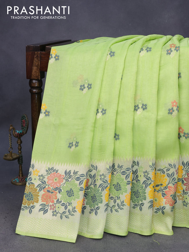 Banarasi raw silk saree fluorescent green with thread & zari woven floral buttas and long floral zari woven paithani border