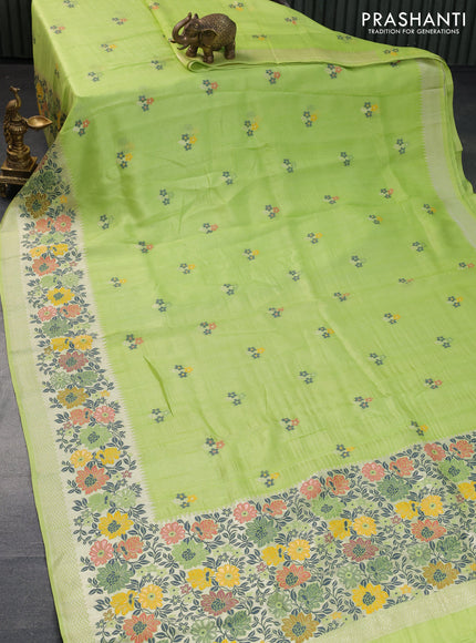 Banarasi raw silk saree fluorescent green with thread & zari woven floral buttas and long floral zari woven paithani border