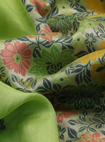 Banarasi raw silk saree fluorescent green with thread & zari woven floral buttas and long floral zari woven paithani border