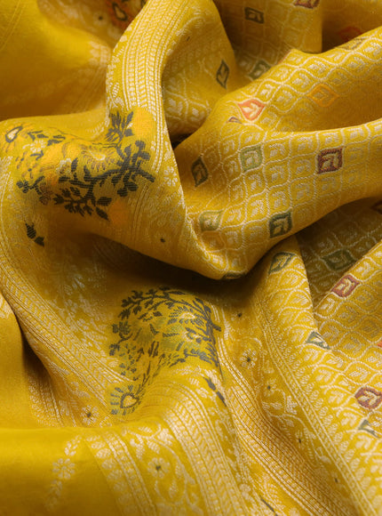 Banarasi raw silk saree mango yellow with allover thread & zari weaves and woven border