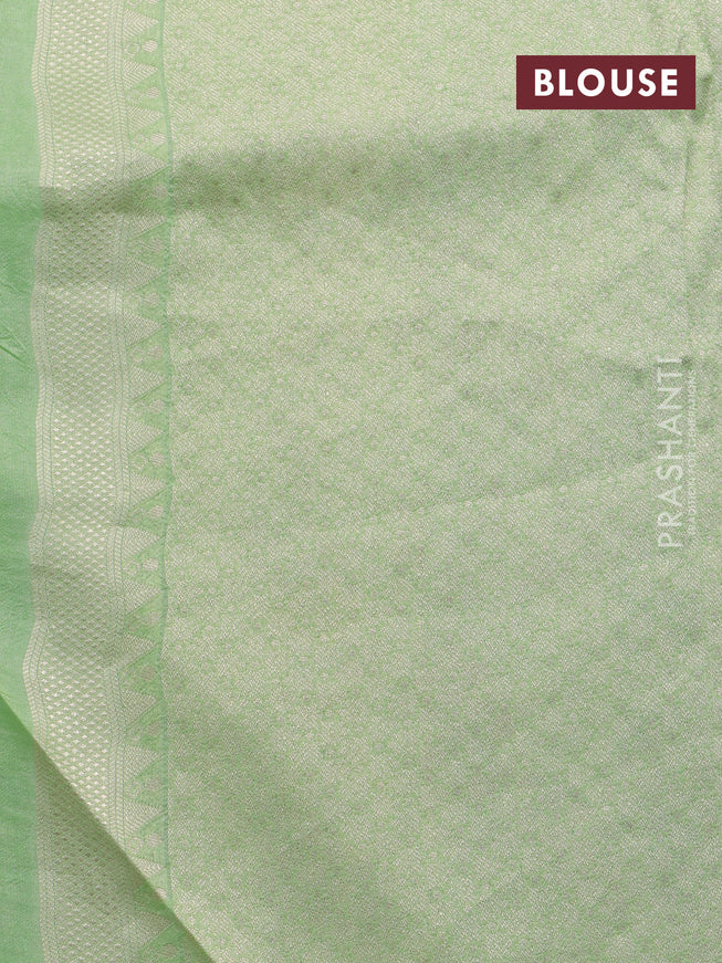 Banarasi raw silk saree pista green with zari woven buttas and zari woven floral zari woven paithani border