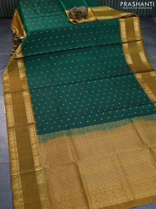 Pure soft silk saree green and dark mustard with allover zari woven buttas and rettapet zari woven border