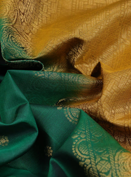 Pure soft silk saree green and dark mustard with allover zari woven buttas and rettapet zari woven border