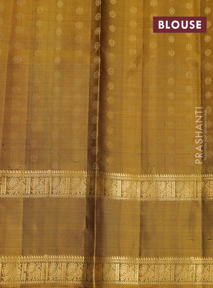 Pure soft silk saree green and dark mustard with allover zari woven buttas and rettapet zari woven border