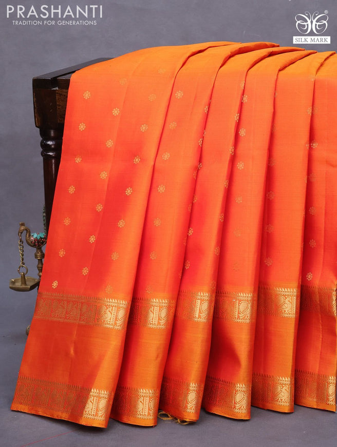 Pure soft silk saree dual shade of orange and mustard yellow with allover zari woven buttas and rettapet zari woven border