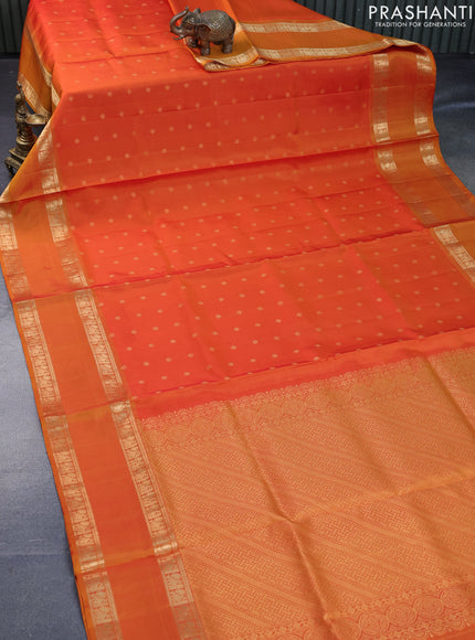 Pure soft silk saree dual shade of orange and mustard yellow with allover zari woven buttas and rettapet zari woven border