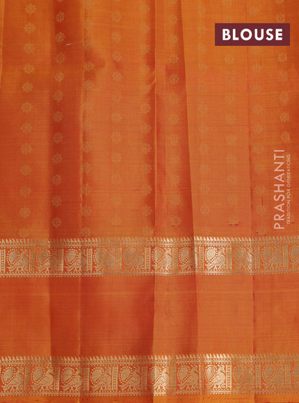 Pure soft silk saree dual shade of orange and mustard yellow with allover zari woven buttas and rettapet zari woven border