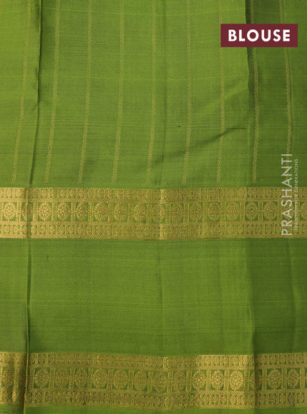 Pure soft silk saree dark mustard and light green with allover zari stripe weaves and long rettapet zari woven border