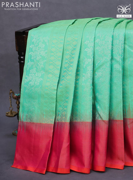 Pure soft silk saree teal green shade and dual shade of pinkish orange with allover silver & gold zari weaves and long zari woven border