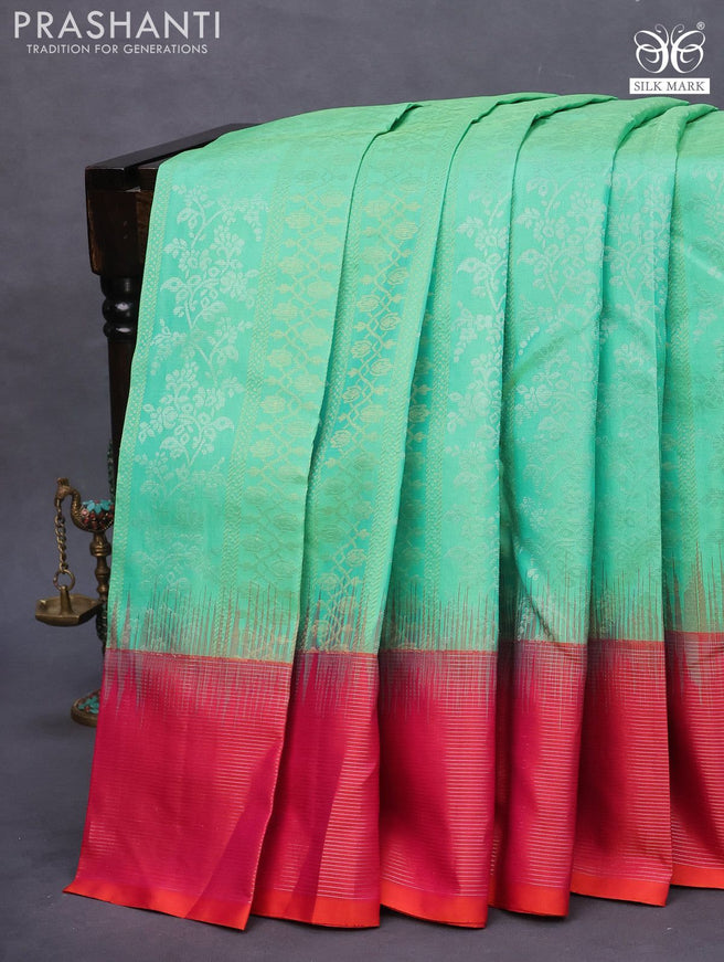 Pure soft silk saree teal green shade and dual shade of pinkish orange with allover silver & gold zari weaves and long zari woven border