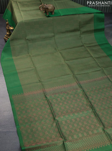 Pure soft silk saree green shade and green with allover thread & zari woven geometric weaves and simple border