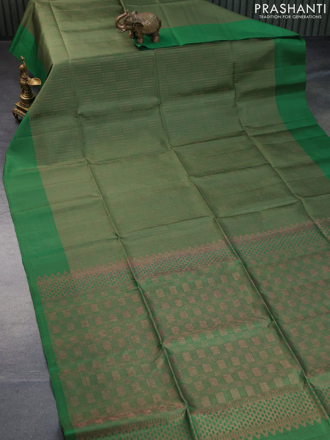 Pure soft silk saree green shade and green with allover thread & zari woven geometric weaves and simple border