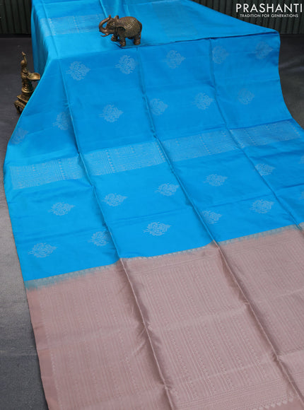 Pure soft silk saree blue and pastel brown with silver zari woven buttas in borderless style