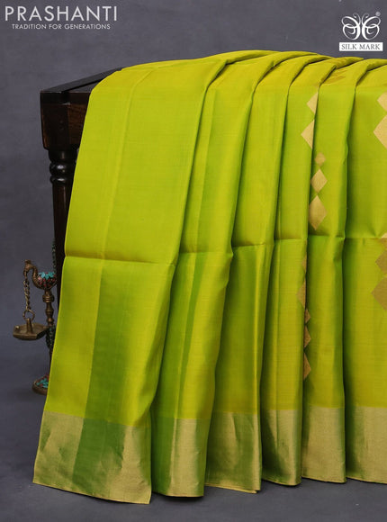 Pure soft silk saree dual shade of light green and green with zari woven geometric buttas and zari woven border