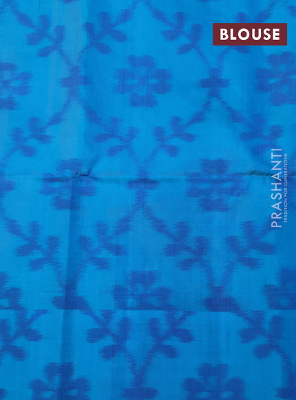 Pure soft silk saree dark blue and teal blue with allover zari woven buttas and ikat style border