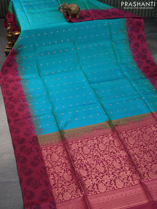 Pure soft silk saree dual shade of bluish green and maroon with allover zari woven buttas and ikat style border