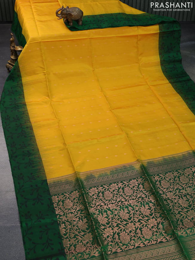 Pure soft silk saree yellow and green with allover zari woven buttas and ikat style border