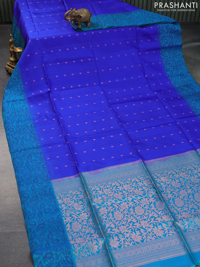 Pure soft silk saree royal blue and dual shade of teal bluish green with allover zari woven buttas and ikat style border