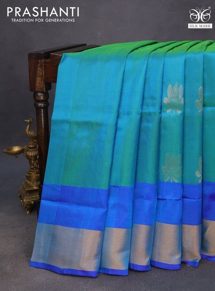 Pure uppada silk saree dual shade of teal blue and blue with silver & gold zari woven buttas and zari woven border